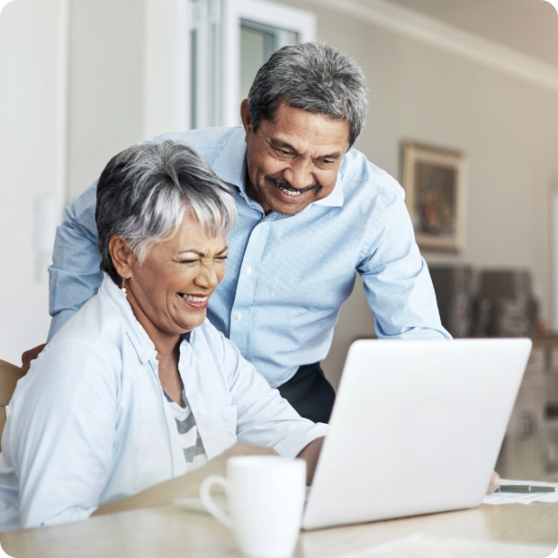 Man and woman looking at computer