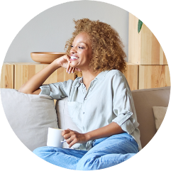 Woman sitting with coffee