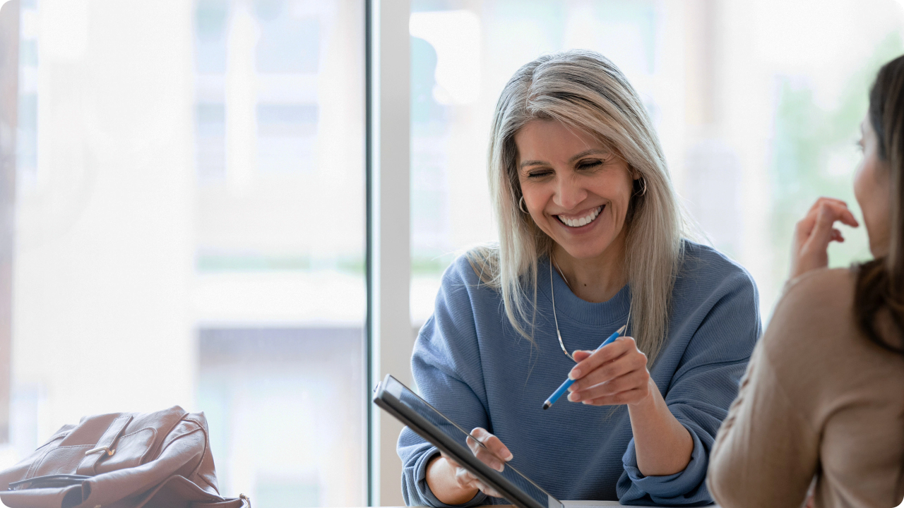 Woman showing ipad